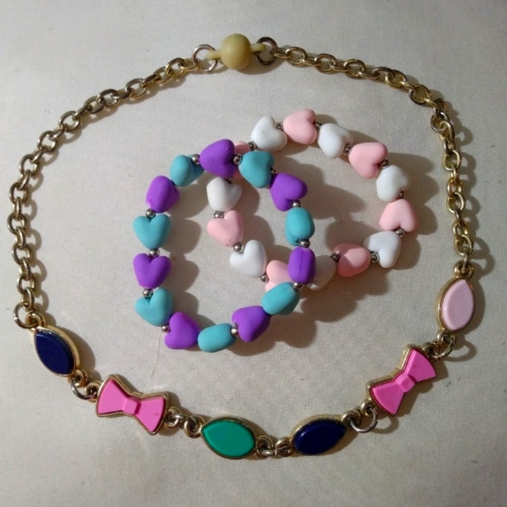Girls Now necklace and Sweet tart. Bracelets